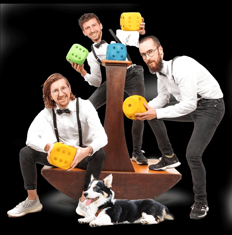 Drie spelers met vlinderdas balanceren op de wankelaar en stapelen dobbelstenen, met een hond ernaast